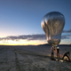 A prototype aerial robotic balloon, or aerobot, is readied for a sunrise test flight at Black Rock Desert, Nevada, in July 2022, by team members from JPL and Near Space Corporation.